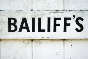 Bailiffs and Setting Aside a Default Judgment
