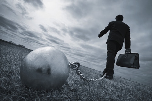 Ball and chain representing restrictive covenants